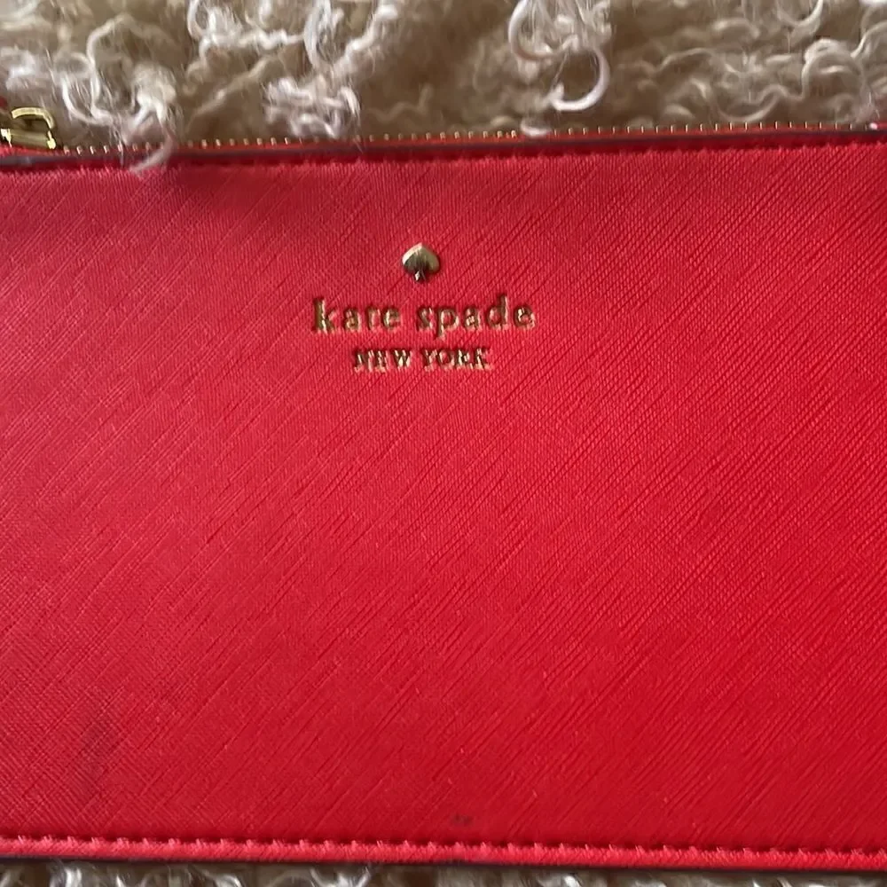 Kate Spade ORANGE MEDIUM ZIP WRISTLET